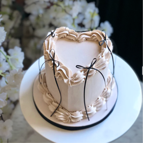 Elegant Heart-Shaped Lambeth Celebration Cake