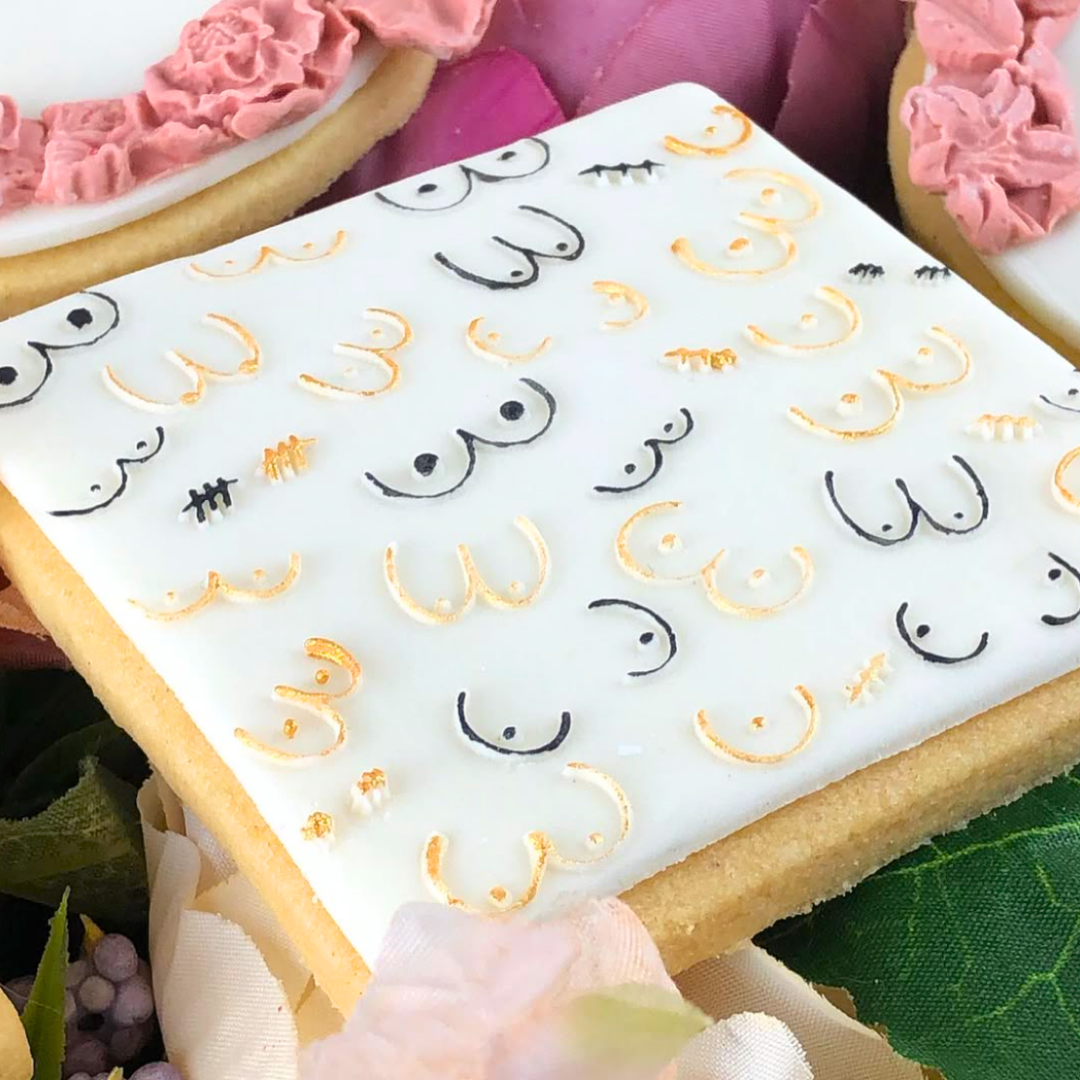 Decorative cookie with Arabic calligraphy on a white background