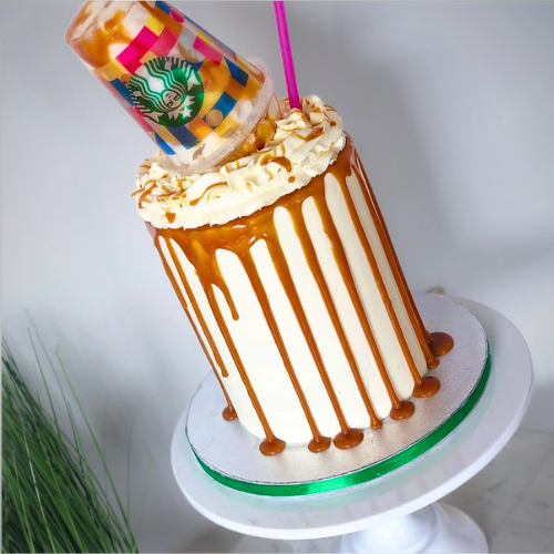 Caramel frappuccino cake with a Starbucks cup on top